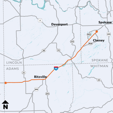 Project map location for the guardrail rehabilitation project on I-90 in Spokane, Adams and Lincoln counties. Two orange dots connected by an orange line on Interstate 90 from the Adams County line to the SR 904 interchange.  