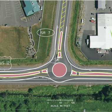 Map of US 12 and SR 7 current intersection with limited intersection control, overlaying the image is a roundabout design showing what the new intersection could look like. 
