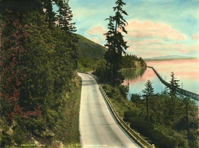 Post card view of Chuckanut Drive looking south, Bellingham Bay to the right., 1926