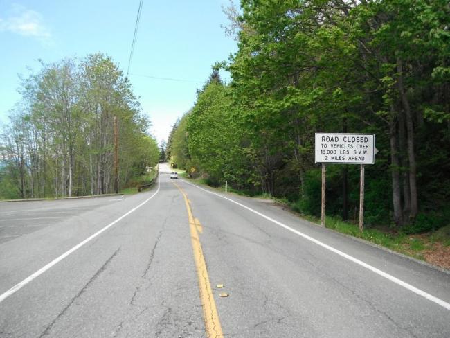 View from Chuckanut Drive with Chuckanut Manor Restaurant parking lot on the left side, 2017.