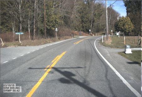 Looking at south end of historic SR 9 segment at intersection of Bassett Road, north edge of Sedro-Woolley, MP 58.42.