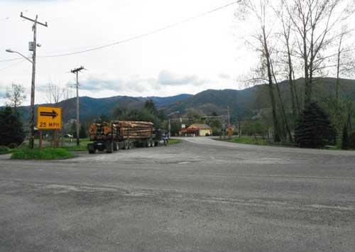 View of railroad crossing at the historic SR 9 segment at curves in Van Zandt at MP 77.38.