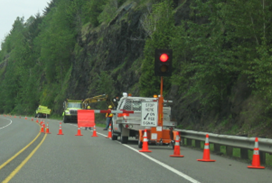 A picture of Automated Flagger Assistance Device on a roadway